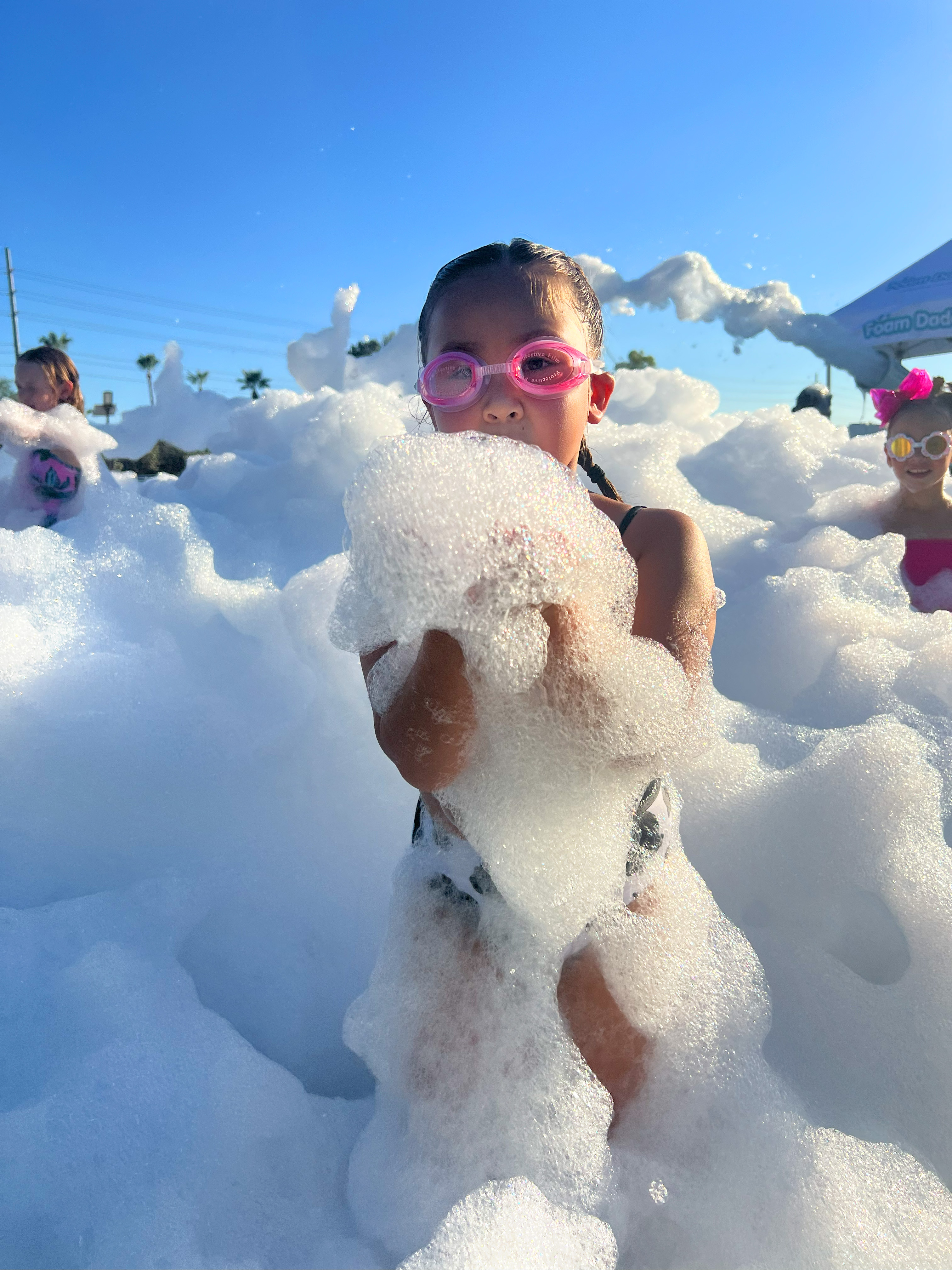 Kid in foam at a Points Up foam party