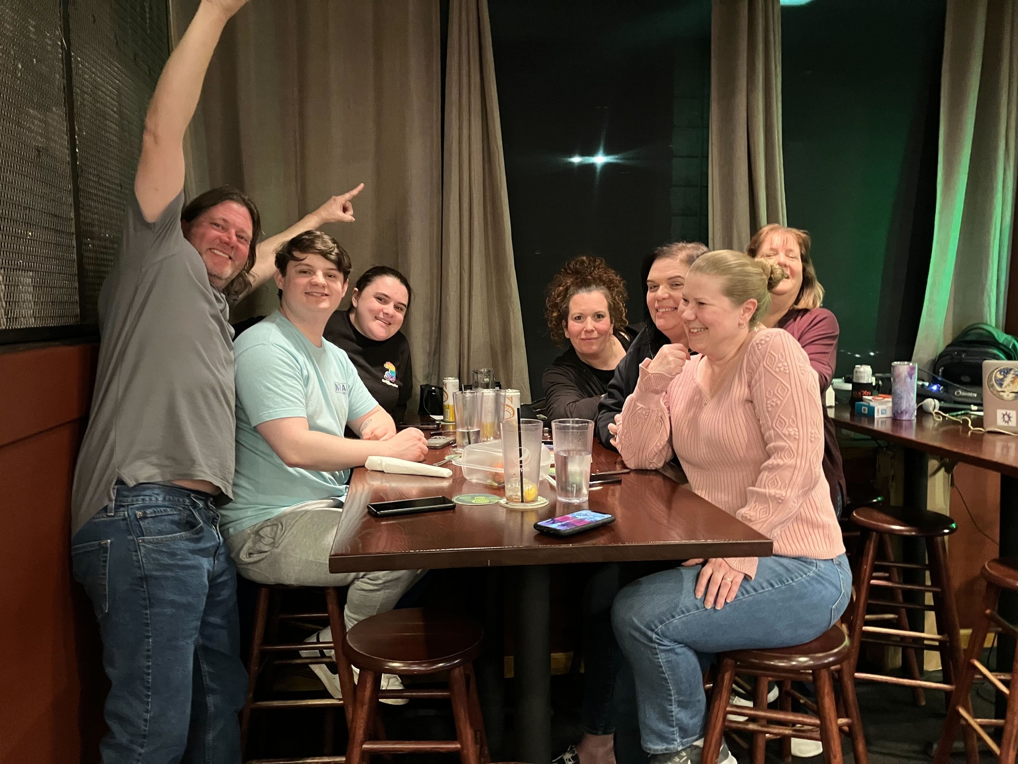 A lively Points Up trivia table mid-game